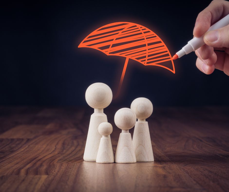 4 difference wooden pieces covered by an umbrella